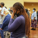attendee receiving prayer at the Defeat Depression Event