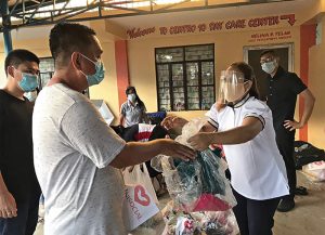 Approximately 700 families received aid from The Universal Church in the Philippines after two typhoons left the country in a state of calamity.