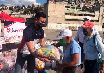 Voluntarios del T-Ayudo de Mendoza, Argentina asisten a las familias necesitadas