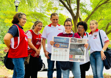 Voluntários da Universal dão assistência a desabrigados em Miami, Flórida.